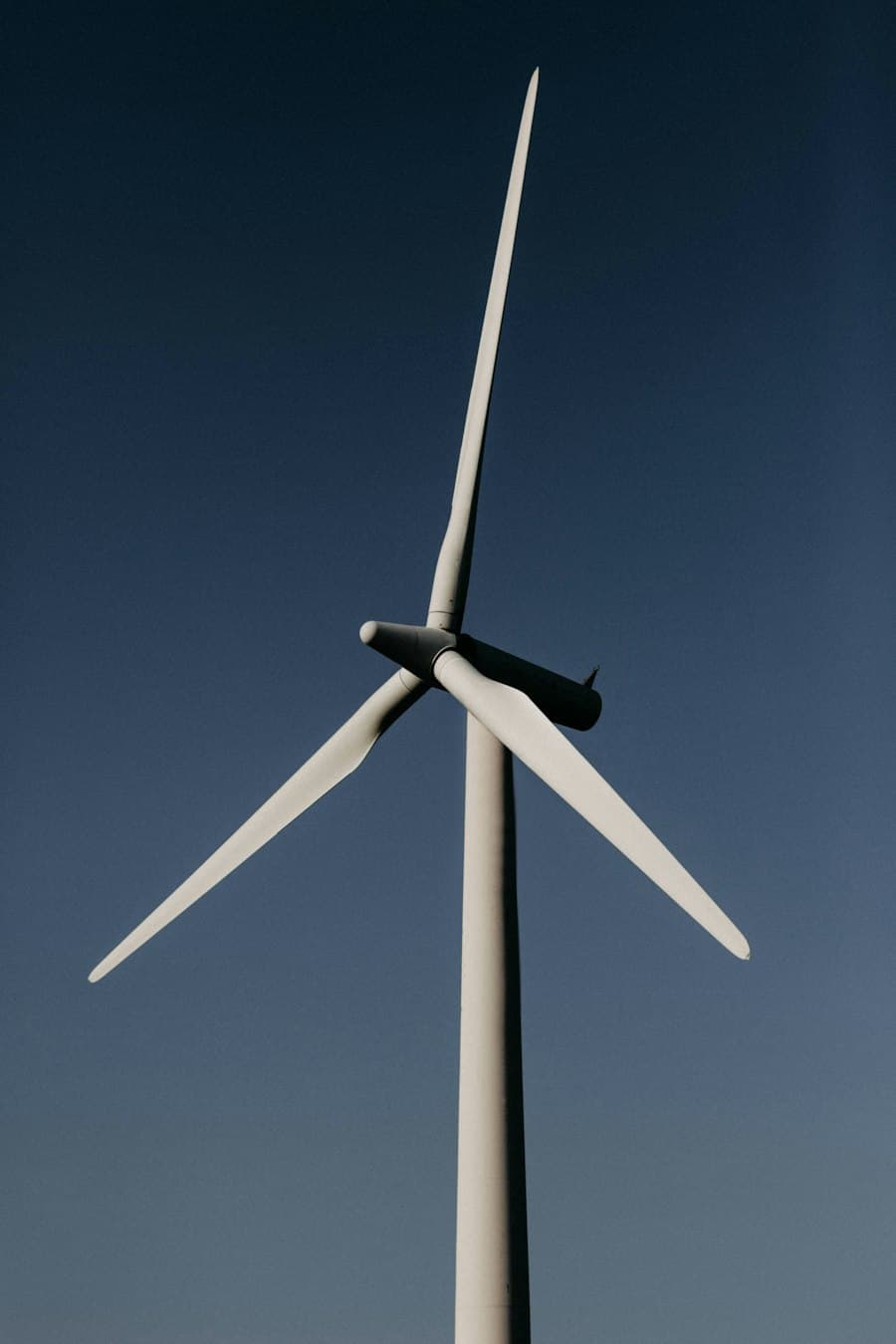 Wind turbine against a blue sky